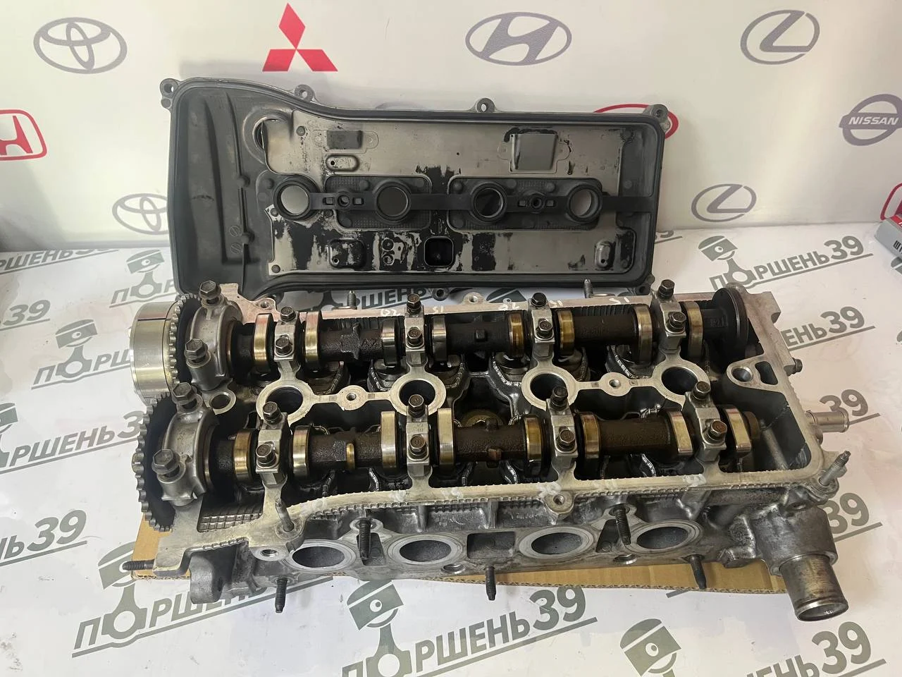 Головка блока клапанов в сборе Toyota 2AZFE 11101-0H040
